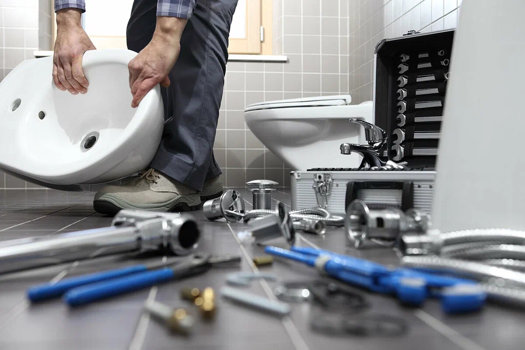 Plumbing tools prepared for a bathroom repair in Gainesville